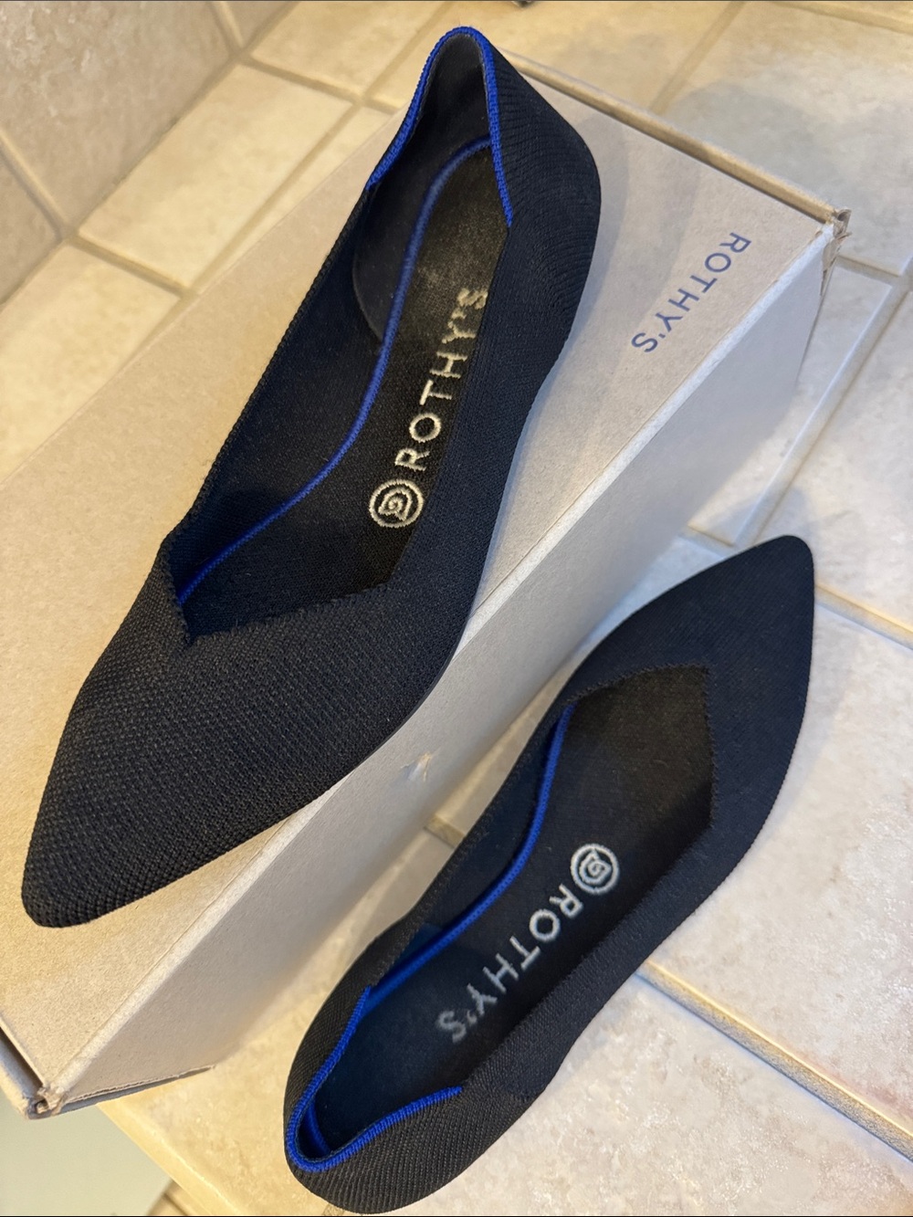 Rothy's Black Pointed Flats with Blue Trim